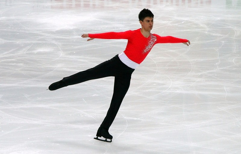 In this physics experiment, learn why this male figure skater spins so fast.