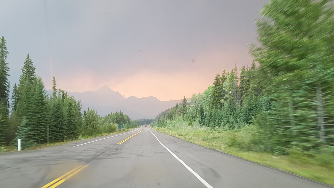 (b) Smoke from a forest fire British Columbia in summer 2018 seen from near Jasper, Alberta