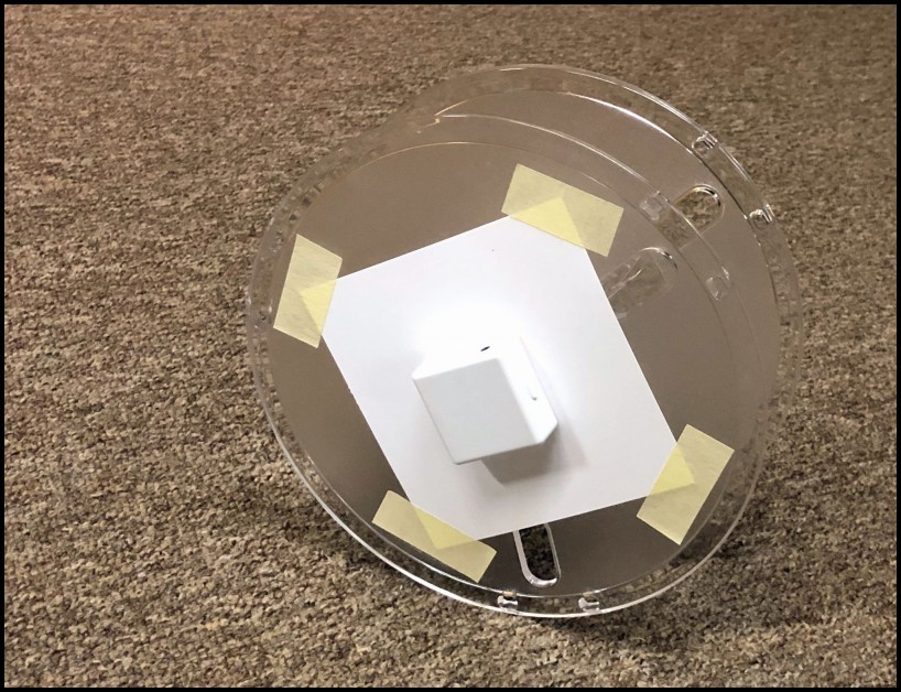 Empty 3D filament reel with PocketLab attached