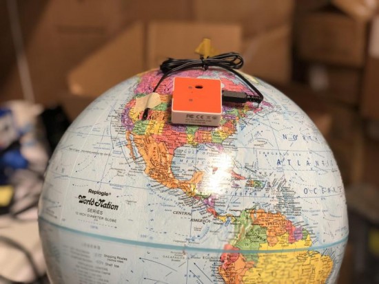 Measuring data on a globe with PocketLab. 